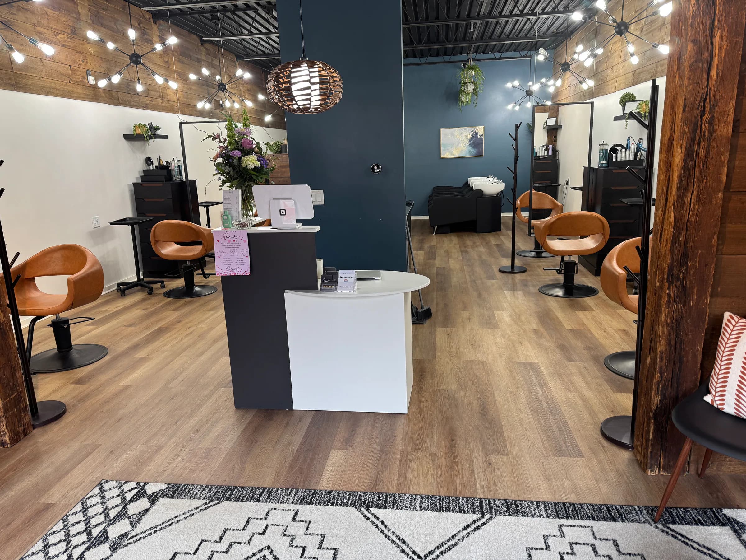 Styling chairs and salon floor featured on the Salon 414 website